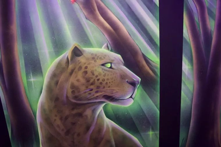 A neon leopard mural