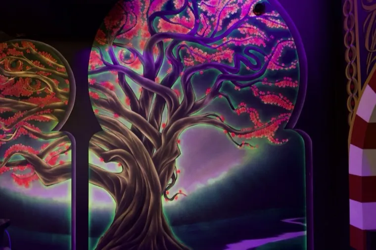 Glowing purple tree mural
